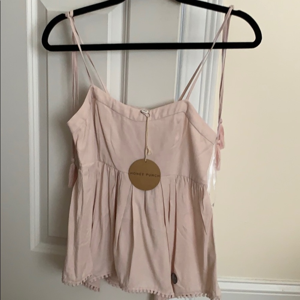 Light pink tank top.
